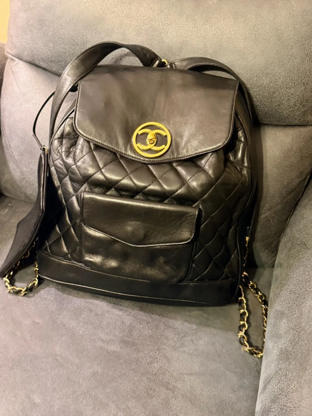 Vintage 24K CHANEL Black Quilted Leather Backpack with Gold CC Medallion
